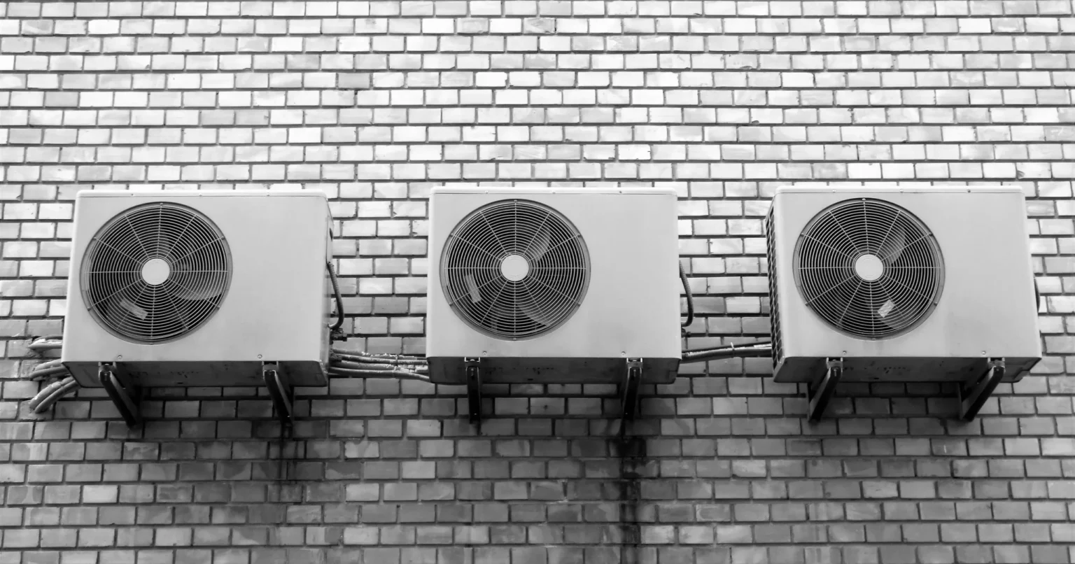 three outdoor AC units