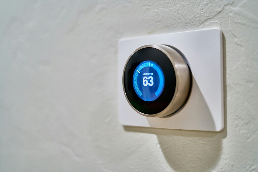 a close up of a smart thermostat